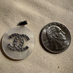 CHANEL Cream and Silver Pendant